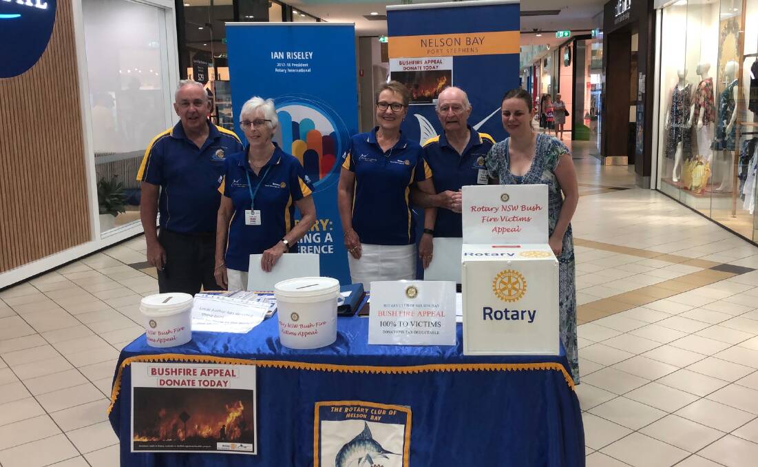 COLLECTION: Nelson Bay Rotarians collecting bushfire funds at the Salamander Bay shopping centre.