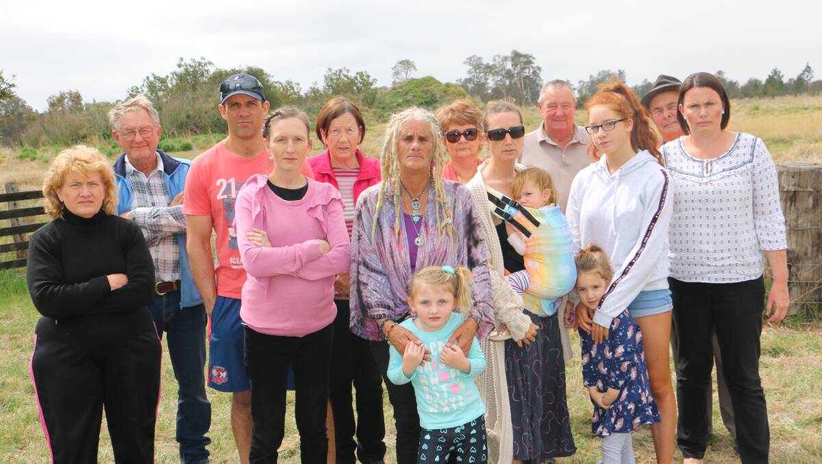 NO TO EARTHWORKS: Residents of Cabbage Tree Road in Williamtown are against an application for landfill on a neighbouring site.