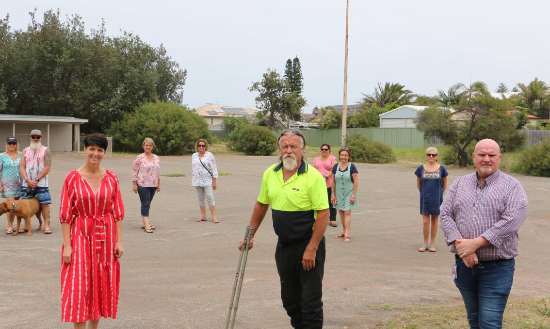 GRANT: Kate Washington with Dave Sams (centre), Cr Chris Doohan and members of the All Abilities park planned for Fishermans Bay Road, Anna Bay.