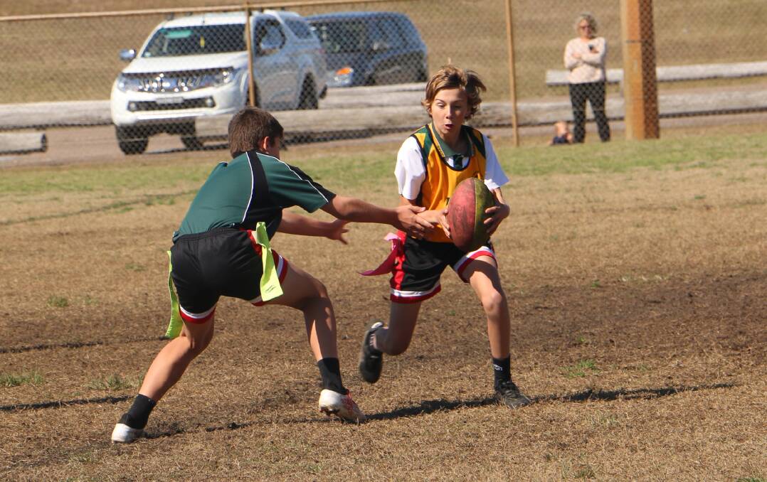 OZTAG ACTION: Close to 800 school children competed in the Hunter Oztag regional carnival at Lakeside last Friday.