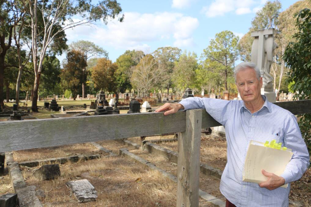 Heritage practitioner Chris Richards at the Pioneer Hill cemetery in Boomerang Park, Raymond Terrace.