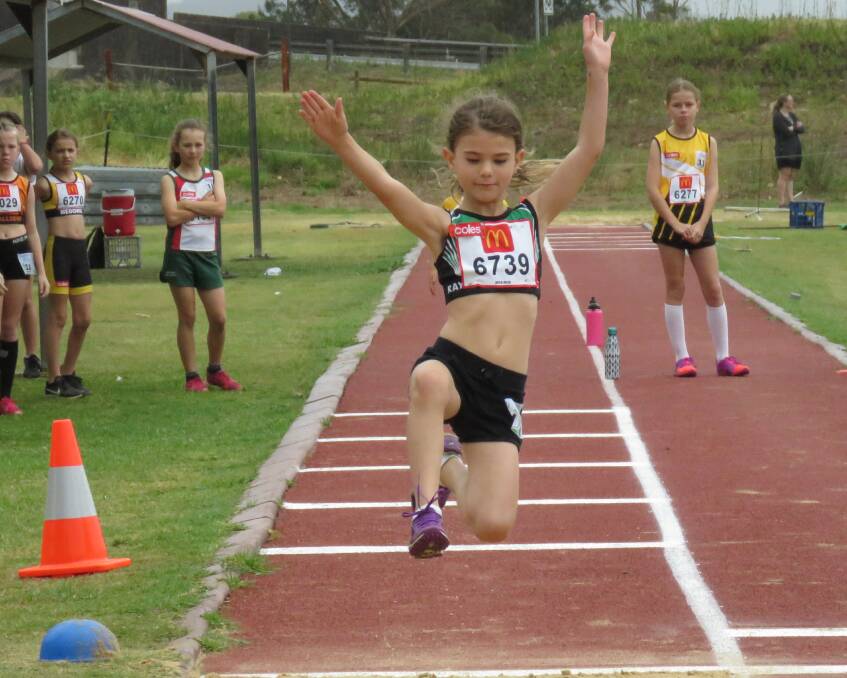 GOLD MEDALIST: Terrace athlete Arlia Drosd with her winning jump.