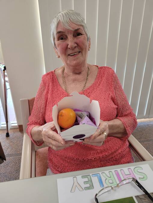 GIFTS: Fingal Haven resident Shirley King, one of several residents involved in making and decorating the fruit boxes for International Nurses Day.