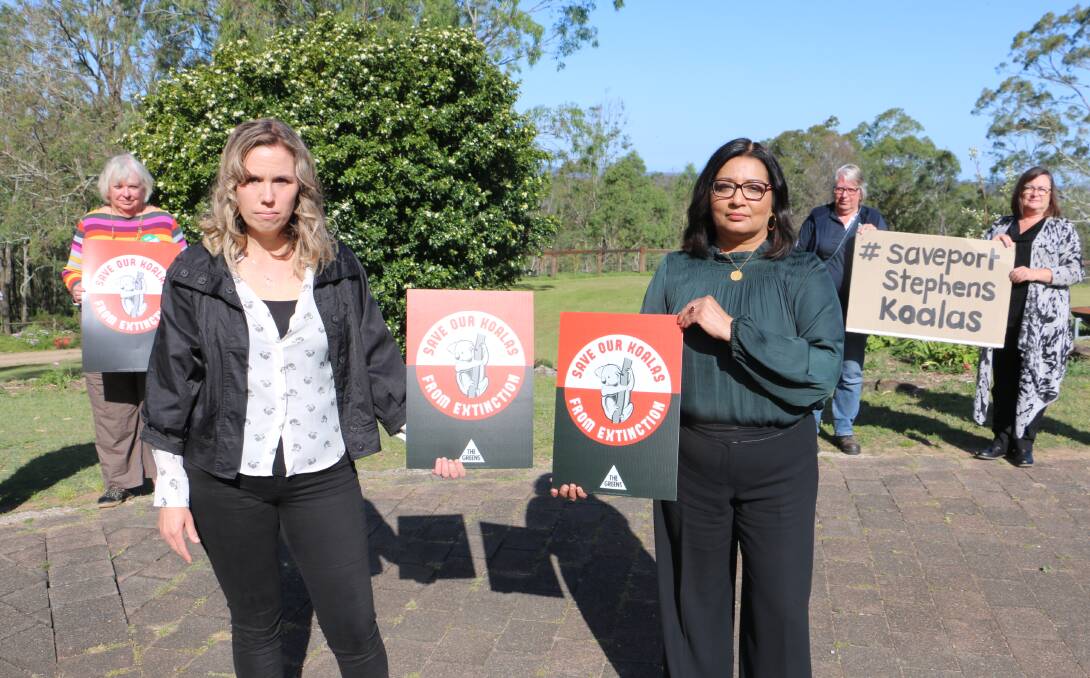 GREENS SUPPORT: Senator Mehreen Faruqi, right, with campaigner Chantal Parslow Redman and supporters at Brandy Hill/Seaham on Monday calling on the Federal Environment Minister to reject the Hanson Quarry expansion.