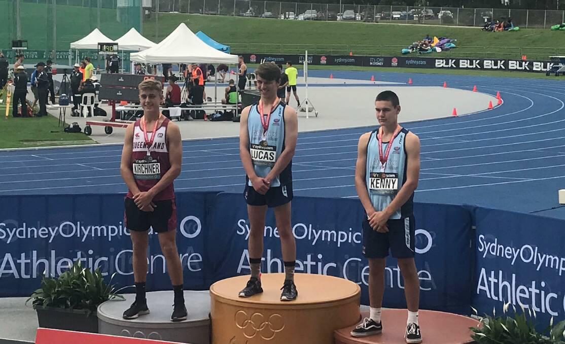 BRONZE: Raymond Terrace athlete Jack Kenny (right) winning the bronze medal in the under 17 javelin event with a 3m personal best throw.