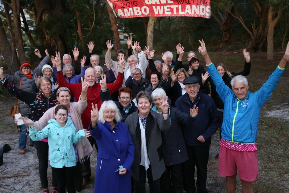 VICTORY: Port Stephens community members show their delight in saving Mambo Wetlands.
