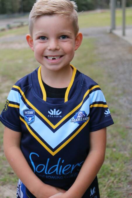 NEW OUTFIT: Blair Cavana, 5, tries out the newly purchased Nelson Bay Junior Rugby League Club outfit.