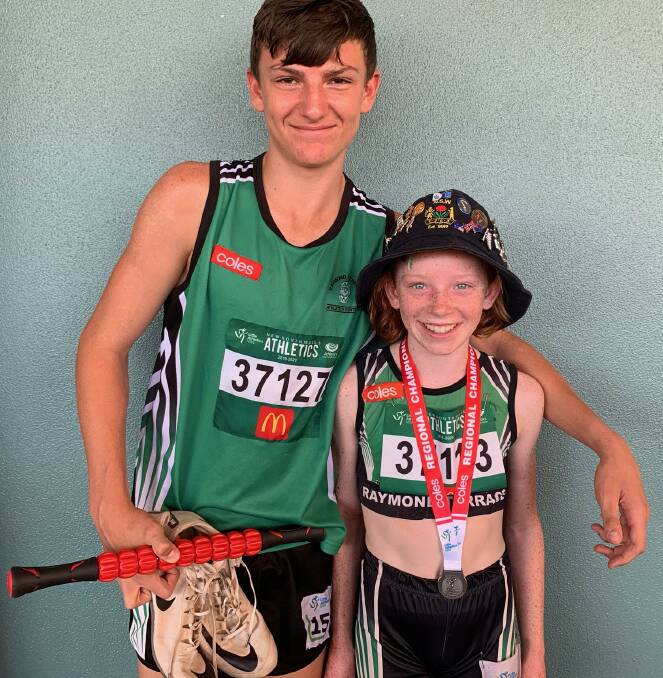 GOLD: Raymond Terrace Athletics Club members Dixie Conlon (under 12) and Cody Walker (under 15) at the regional championships earlier this year. Picture: Supplied