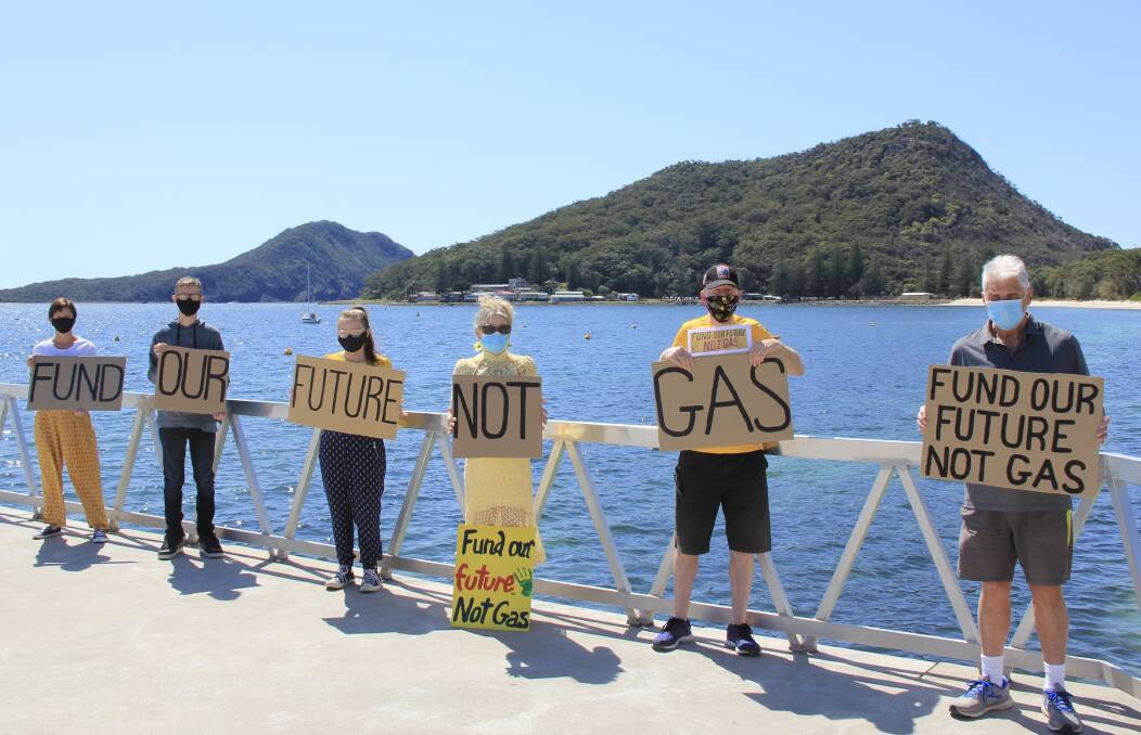 RALLY: Port Stephens environmental group members, including CAPS, show their support for a cleaner future at Shoal Bay. Picture: Supplied