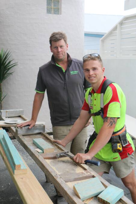 TOP APPRENTICE: Jack Dunn being supervised by Shane Ridgeway on the job at Corlette this week. Jack recently picked up an Apprentice of the Year award.