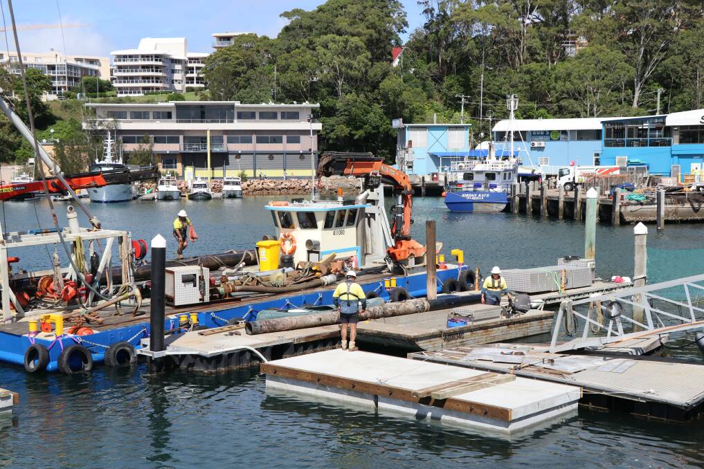 REPLACEMENT: Work on replacing the Marine Rescue Port Stephens dock at Nelson Bay marina last Tuesday. Picture: Supplied