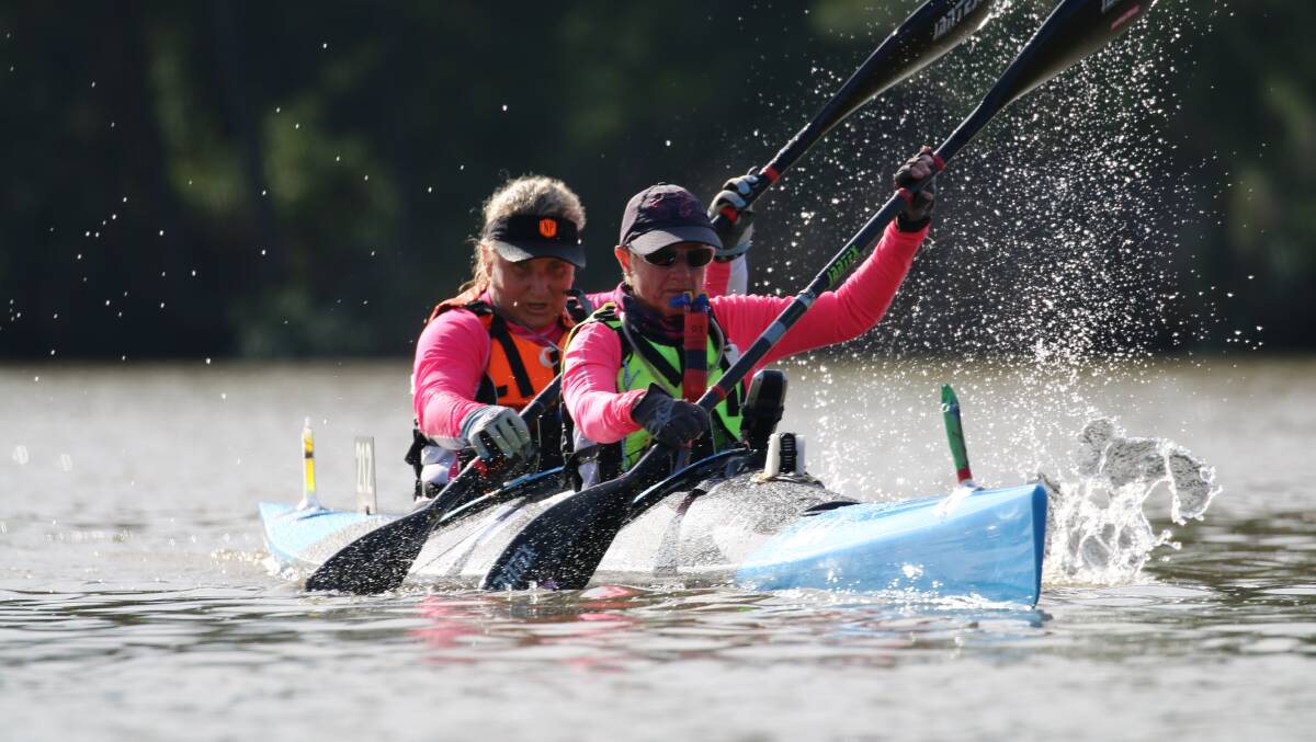 OARSOME: Charly Wellard and Anne Moore power their way in their canoe to a record win in the Hawkesbury Classic. Picture by Ian Wrenford