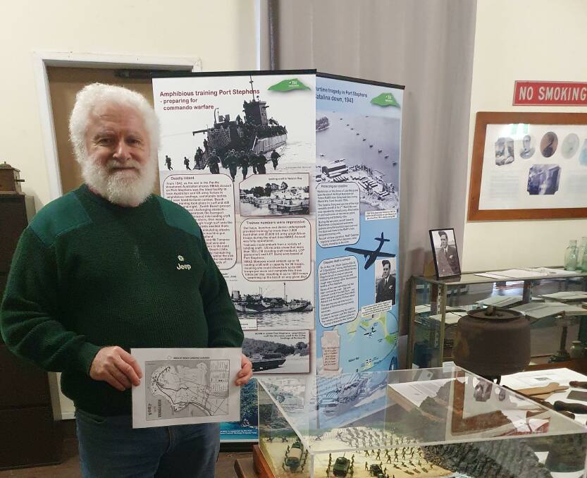  DISPLAY: Roger Rigby with the diorama.
