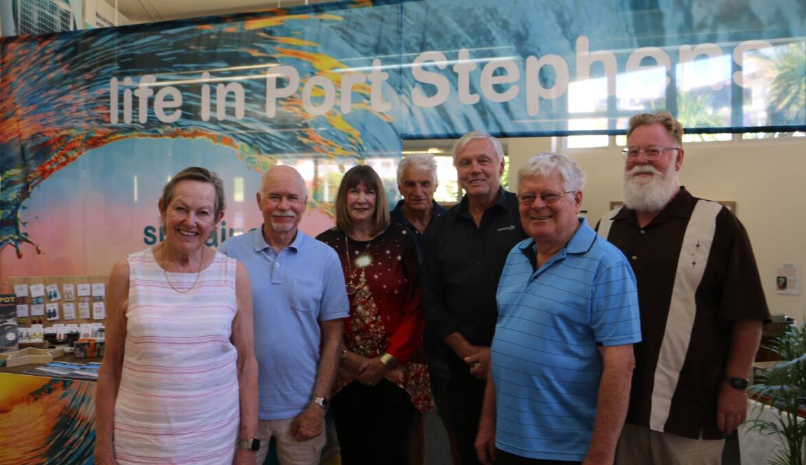 TEMPORARY HOME: TMA members (from left): Liz Warne, Chris Peters, Gabrielle Carrick, Nigel Dique, Doug Cross, Warwick Mathieson and Ross Carroll in front of the new exhibition.