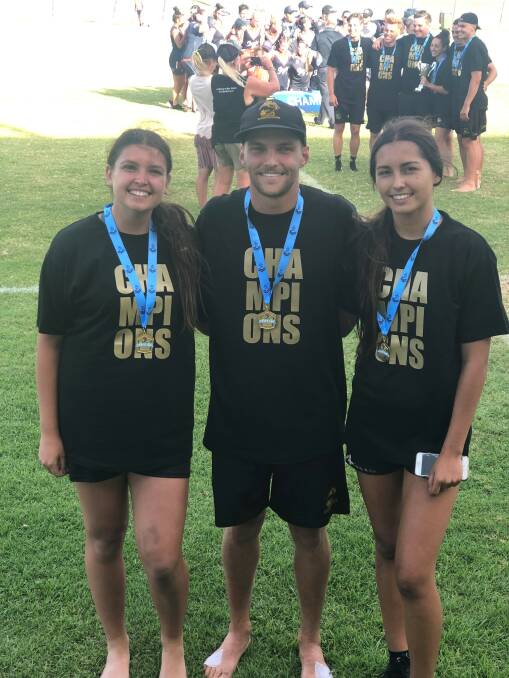 CUP WINNERS: Sisters Bobbi (left) and Andi Law with Mitch Wilton - grand final victors at the Port Macquarie touch footy State Cup carnival.