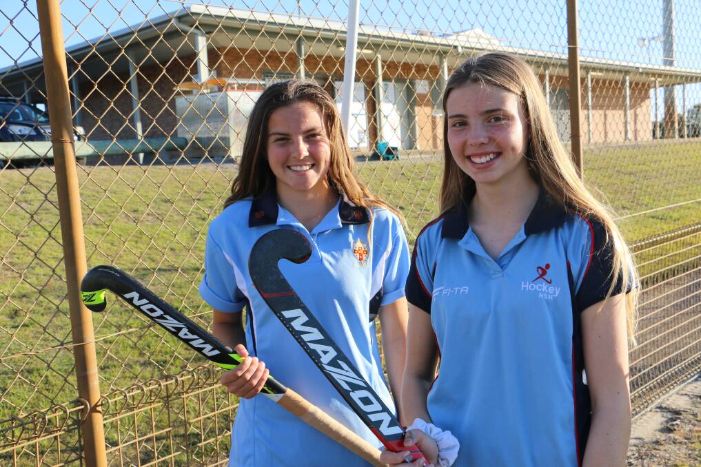 REP SIBLINGS: Hockey sisters Grace Baxter, 15, and Hannah Baxter, 13, at the Nelson Bay hockey fields.