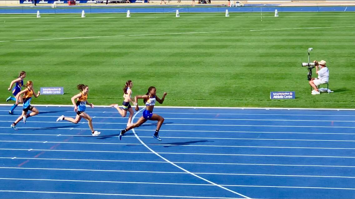 Shari Hurdman in action on the athletics track.