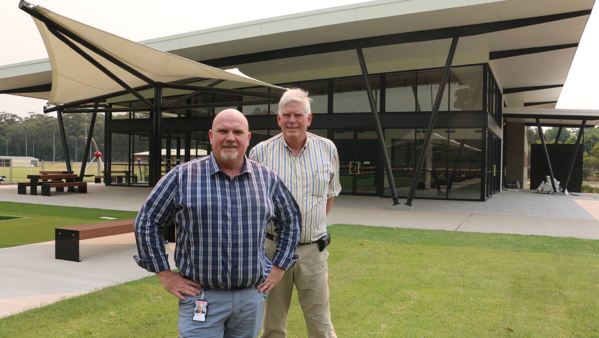 EXPRESSIONS OPEN: Cr Chris Doohan and Medowie Sports and Community Club president Craig Baumann admiring the construction completition last December.