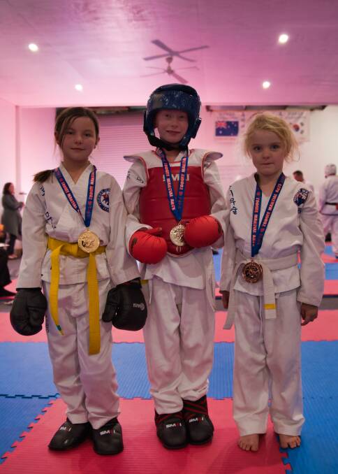 SPARRING: The girls 8-10 years sparring pplacegetters (from left) 1st Naiya Ireland, 2nd Kendall Huckstadt, and 3rd Kayleigh Thompson. Picture: Supplied