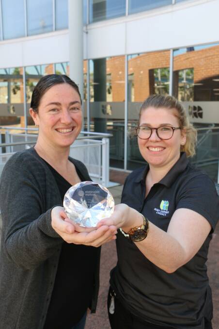 AWARD WINNING: Port Stephens Council climate action and environmental managers Kylie Kaye and Kirily Sheridan with their highly commended trophy.
