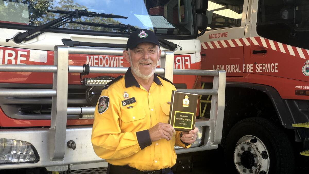 LIFER: Firefighter John Pociask has been awarded life membership of the Medowie Rural Fire Service for his 46 years of service. Picture: Gavin Smith