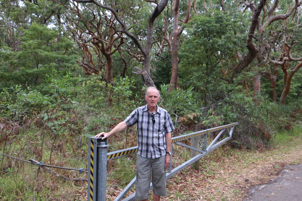 FIRE FEAR: Shoal Bay's Stephen Ritchie and neighbours say the gate which leads to Box Beach is not being locked at night as specified by National Parks.