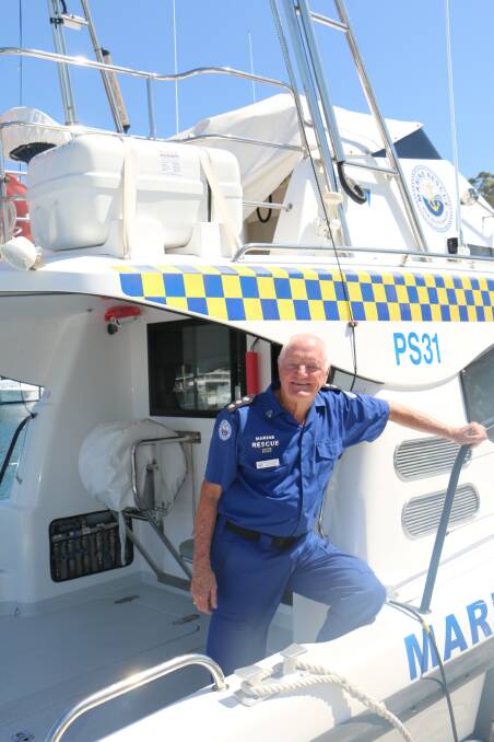 STAY SAFE: Marine Rescue Port Stephens unit commander Colin Foote aboard one of the patrol's two vessels, the John Thompson, at Nelson Bay marina.