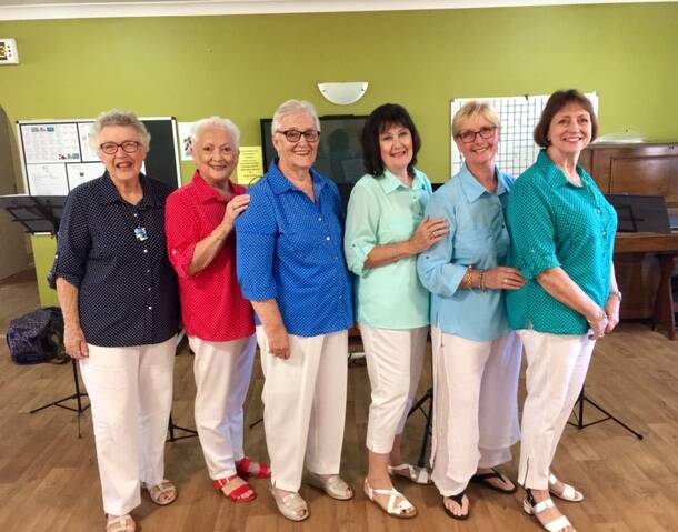 The Seaside Singers ladies ensemble prepare for the fundraising concert to be held at Soldiers Point Bowling Club on September 14 from 2pm.
