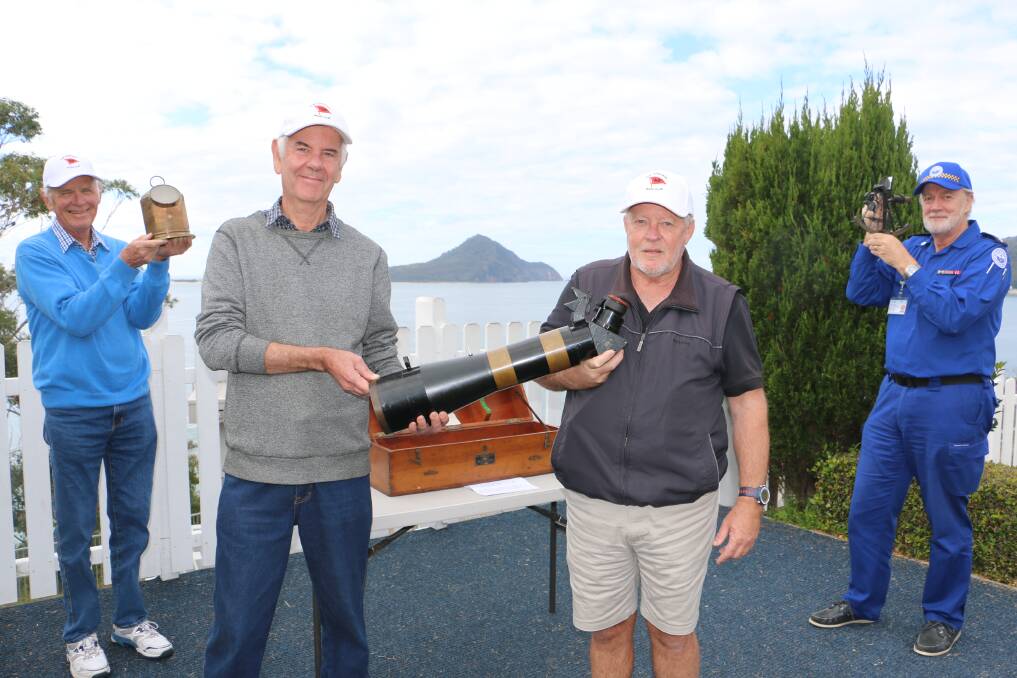 RARE FIND: At the presentation were PSYC commodore John Townsend (with compass), members Greg Cumberland and David Simm holding the telescope and Ben Van Der Wijngaal with the sextant.