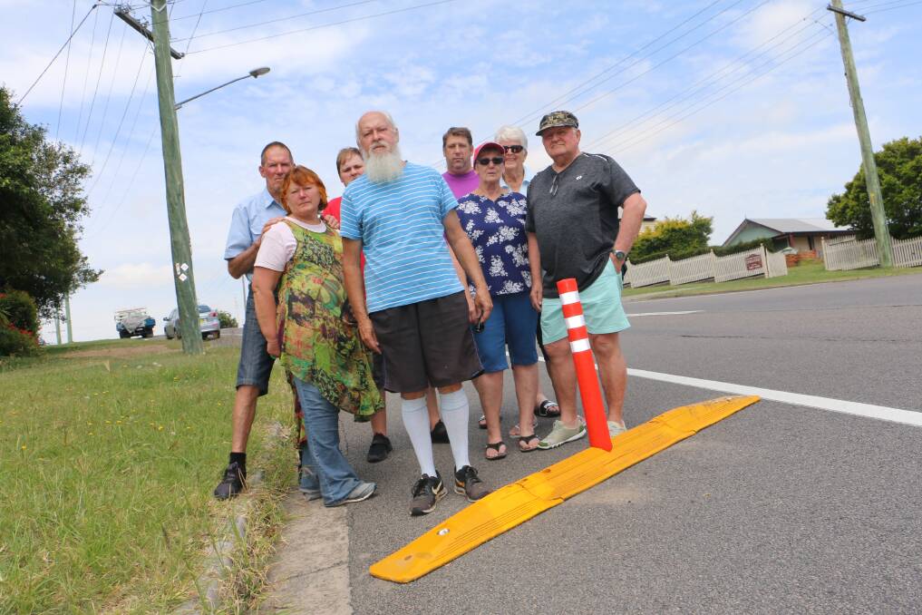 ANGRY: Thomas Street residents, including Bob Taylor (front centre) upset with the bollards installed on Mount Hall Road.