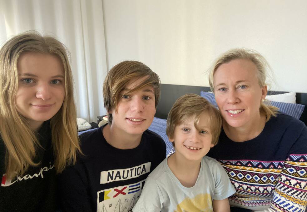 STUCK: Fiona Neal with her three children, Annabelle,16, Lukas, 13, and James, 7, in Dubai. They are hoping to be reunited with loved ones in Fingal Bay. Picture: Supplied