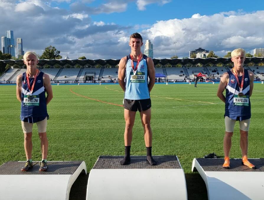 CHAMPION: Cody Hancock, centre, on the podium after his gold medal performance in the nationals in Melbourne. Picture: Supplied