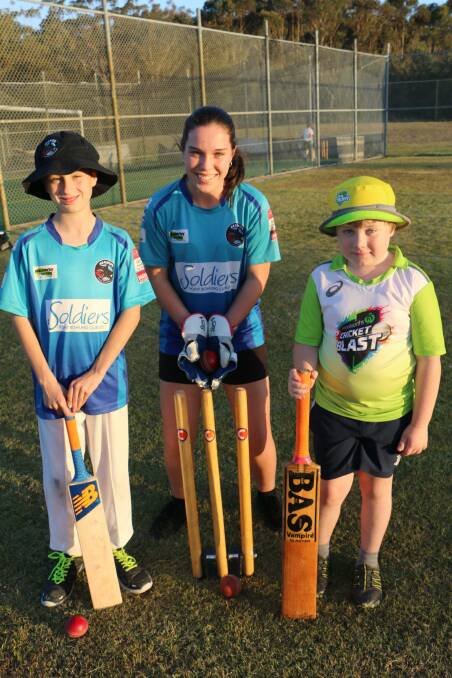 Nelson Bay junior cricketers (from left) Aaron Clayton, 12, Lillee Banks, 13 and Riley Goodwin, 8.