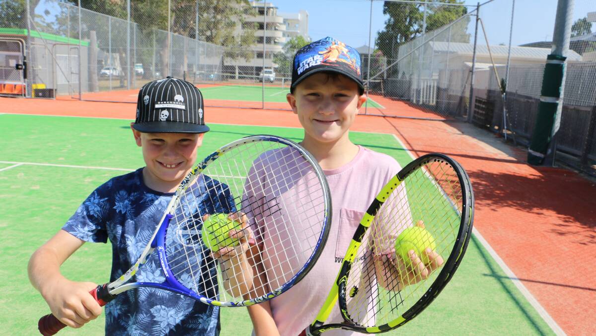 Soldiers Point Tennis Club brothers Harrison, 8, and Charlie Marklew, 11.