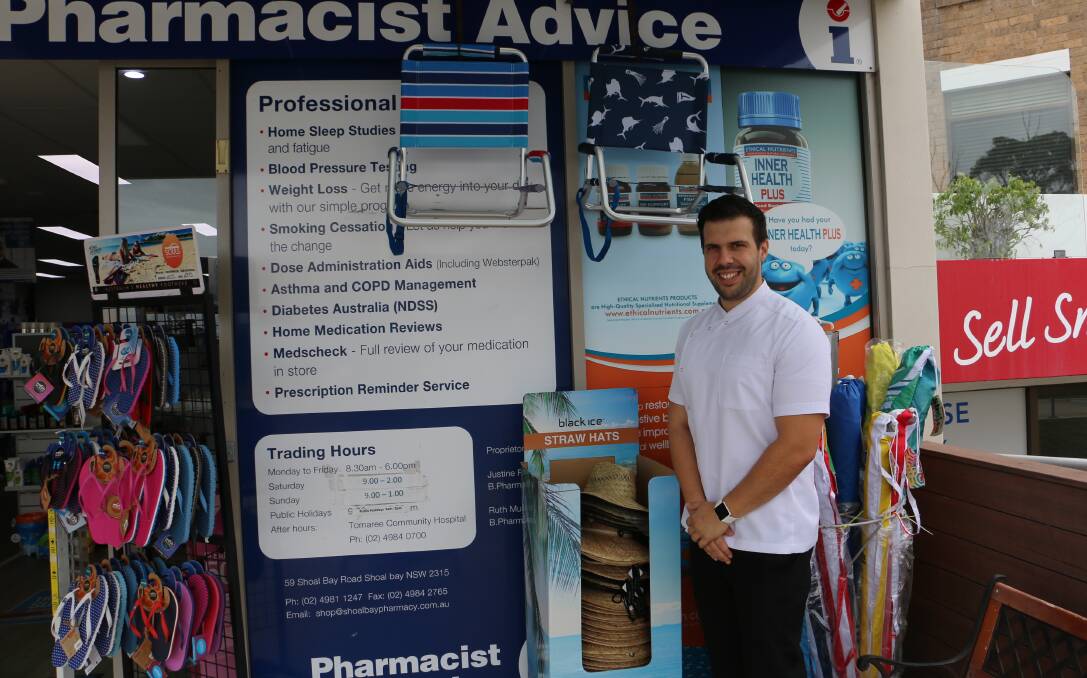 EMERGENCY: Pharmacist Jamie Pisani in front of his Shoal Bay business where he hopes to attach a defib in a safety box for public use.