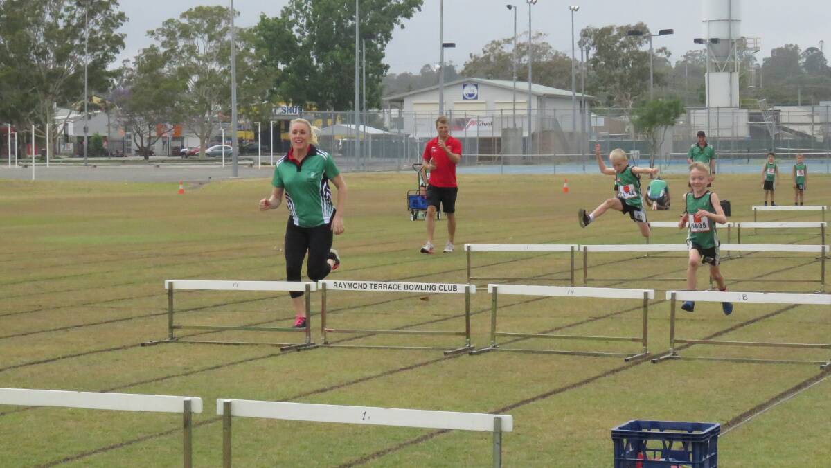INSPIRATION: Australia's Olympic gold medalist Sally Pearson taking some Raymond Terrace atheltes through their drills. Picture: Supplied