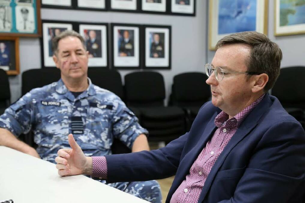 MAKING A POINT: Chris Birrer (right), the Defence official charged with liaising with Port Stephens communities over the PFAS contamination, and Group Captain Peter Cluff, Senior Australian Defence Force Officer at RAAF Base Williamtown.