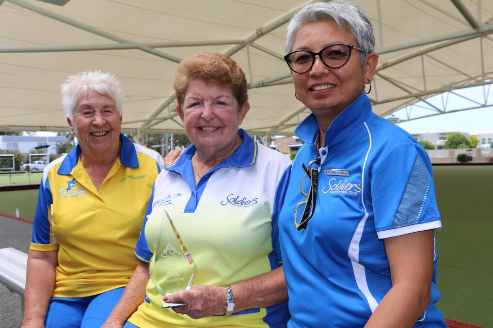 REWARDED: Soldiers Point Bowls Club member Pam Smith, flanked by Helen Brown (left) and Pat Krestensen, with her award.