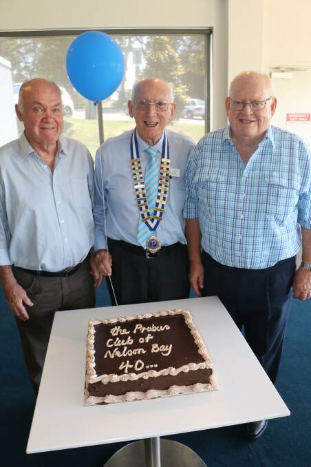 BIRTHDAY: Nelson Bay Probus Club president Ian Sloggett (centre) with secretary Dave Watson (left) and Bill Gainsford (social director).