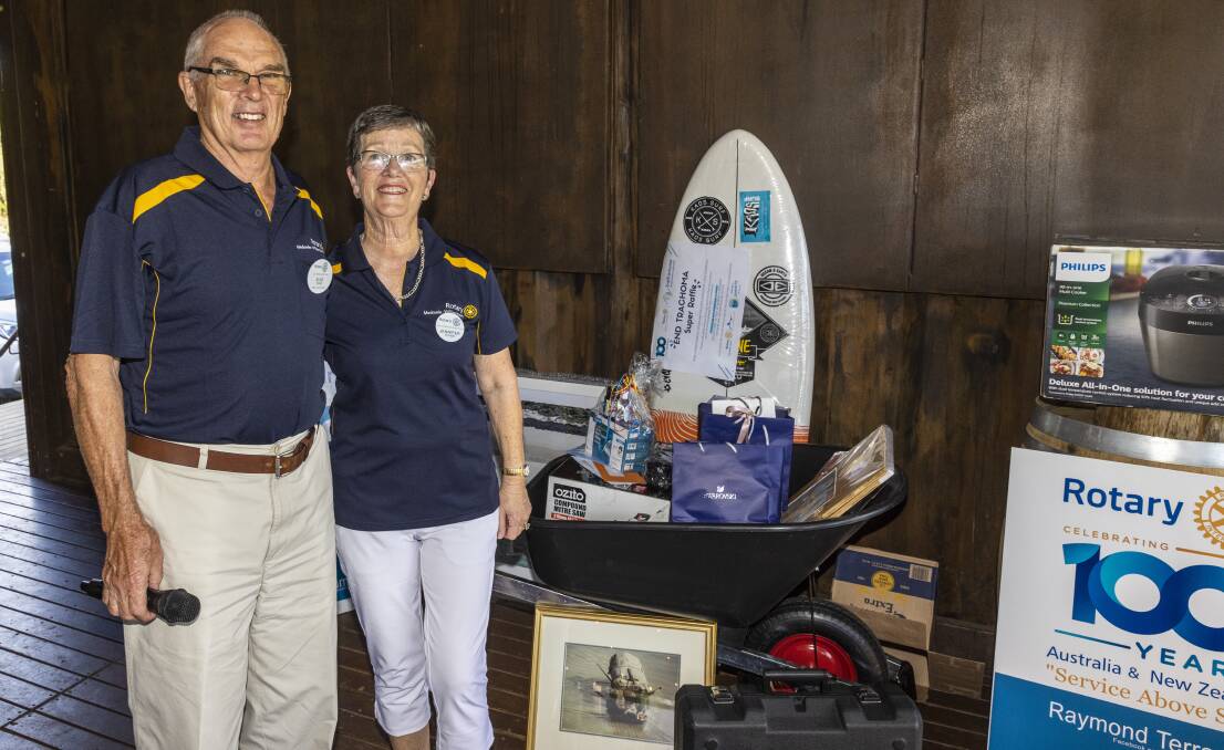WINNER: David Fisher with wife Jennifer and the raffle prize at the Rotary 100 years celebrations. Picture: Henk Tobbe