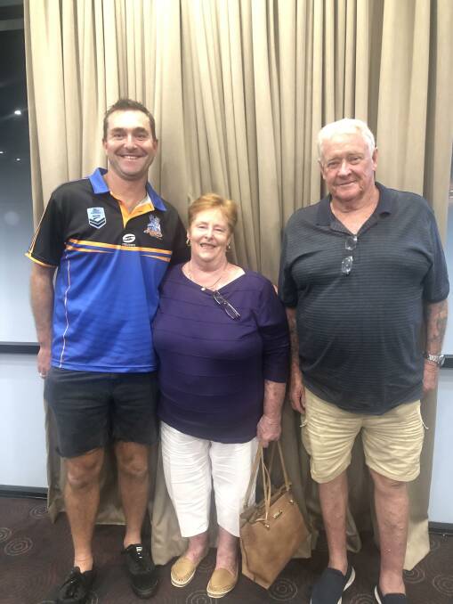 HONOURED: Micki and Doug Samuel with Nelson Bay Touch Association president Ian Doherty. Picture: Janine Law