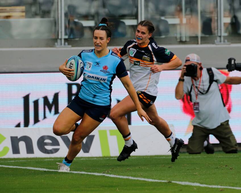 TRY TIME: Nelson Bay's wing sensation Maya Stewart on her way to another five-pointer for the NSW Waratahs. Picture: John Flitcroft