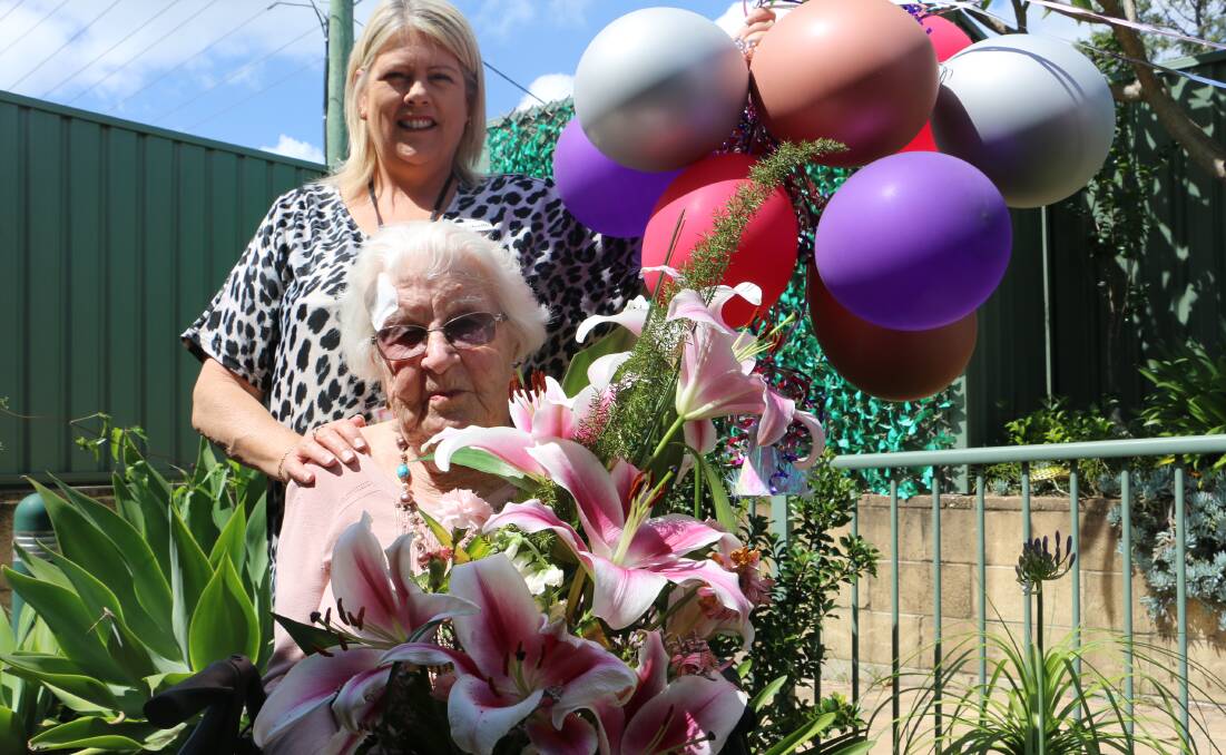 CELEBRATION: Joyce Wood celebrates her 102nd birthday with Raymond Terrace Gardens nursing home manager Michelle Armstrong.