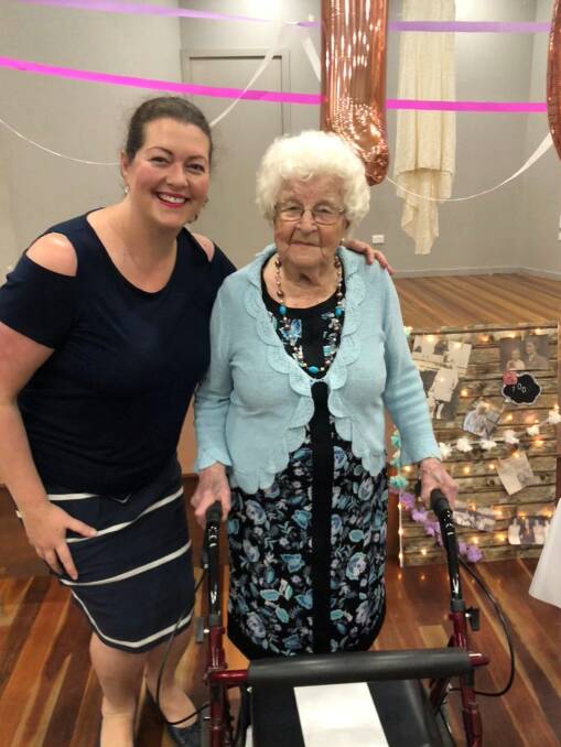 CENTENARIAN: Port Stephens councillor Jaimie Abbott helps her great aunt Joyce Wood celebrate her 100th birthday.