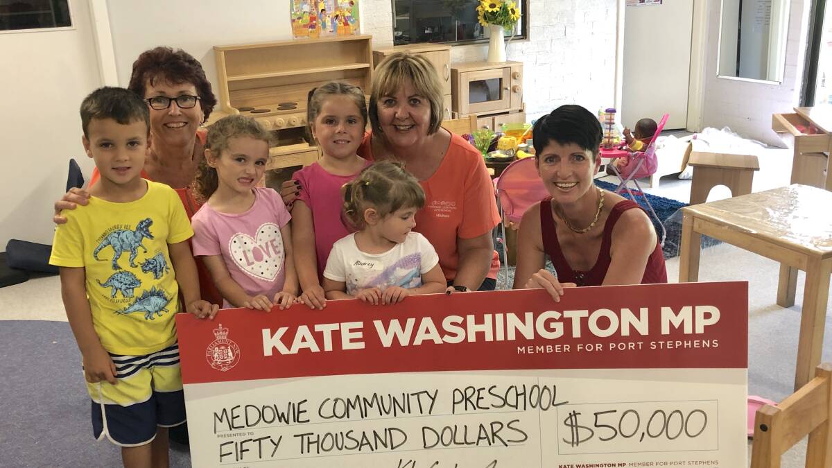 GIFT: Kate Washington congratulates Medowie Community Preschool educator Monica Murray and preschool director Michele Ireland on their successful grant application.