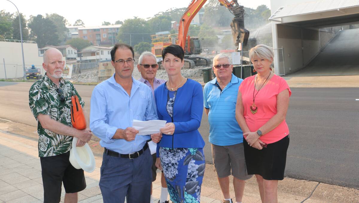 SHUT OUT: Nelson Bay busniessman Allan Cassano with MP Kate Washington show their disappointment with the relocation of the CLC with Nigel Waters, Don Whatham, Warwick Mathieson and Linda Drake.