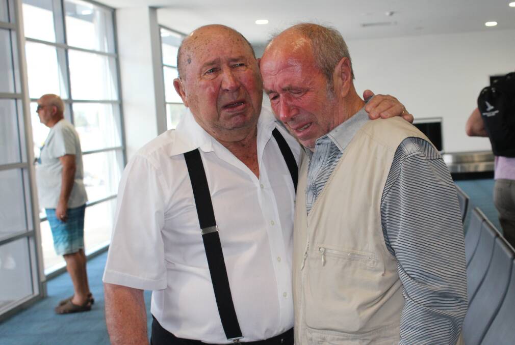 UNITED: Michail Boldyrew, of Fern Bay, with his brother Ivan Boldyrew, of Russia, together at Newcastle Airport. 