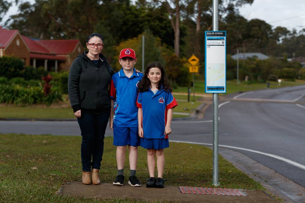 Upset: Jacqui Stokes' children Lucas, 11, and Kaylee, 8, were stranded at a bus stop in Medowie on the first day of term three. Picture: Max Mason-Hubers