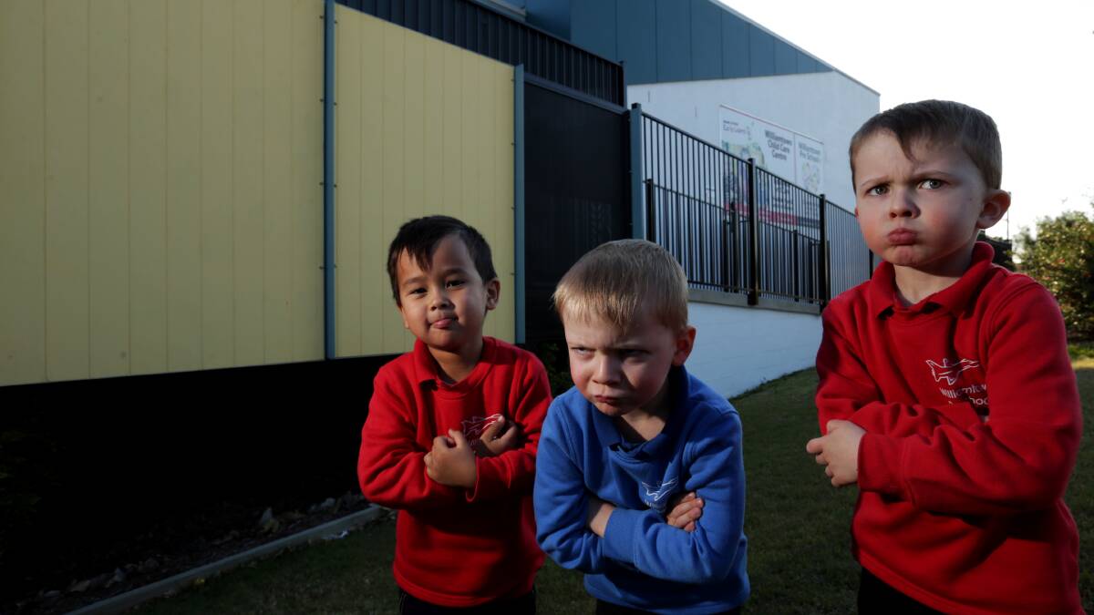 NOT HAPPY: From left, Fletcher, 3, Saxon, 3, and Dominic, 4, disappointed at the Department of Defence's decision to renege on building a purpose-built chlld-care facility at Medowie. 