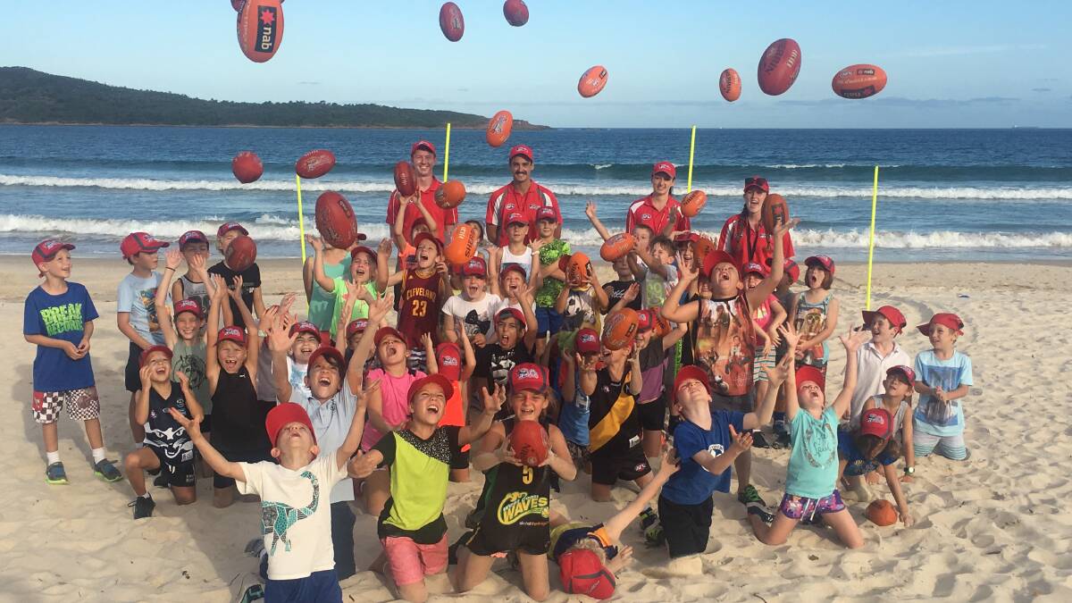 BIG HIT: A new initiative combining the beach with the AFL Auskick program has been met with a positive reception in Port Stephens. Picture: Supplied